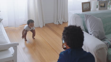 happy-father-taking-video-recording-of-baby-using-smartphone-proud-dad-photographing-cute-toddler-walking-sharing-fatherhood-lifestyle-on-social-media