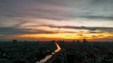 soar above a vibrant city skyline bathed in golden sunset hues. this stunning stock video captures the urban beauty and serene ambiance, perfect for intros, backgrounds, or cinematic projects