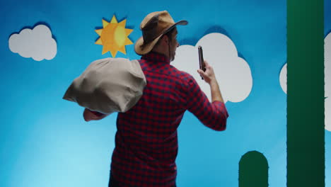 cowboy with bags and instrument