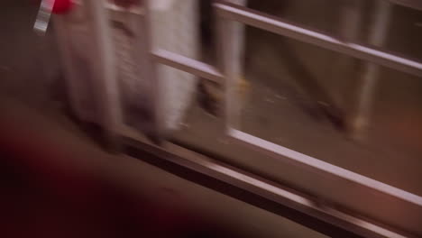 close-up view through a moving car window on a highway at night, with interior reflections