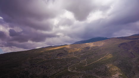 Time-lapse-moving-clouds-shower-over-clear-countryside-valley-in-rural-area