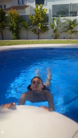 woman swimming in a pool