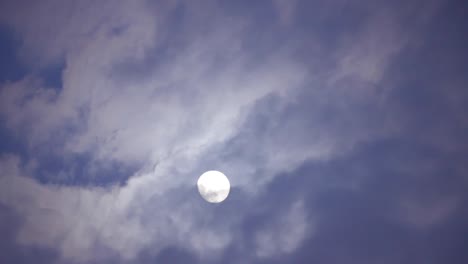 moon shining with clouds ahead