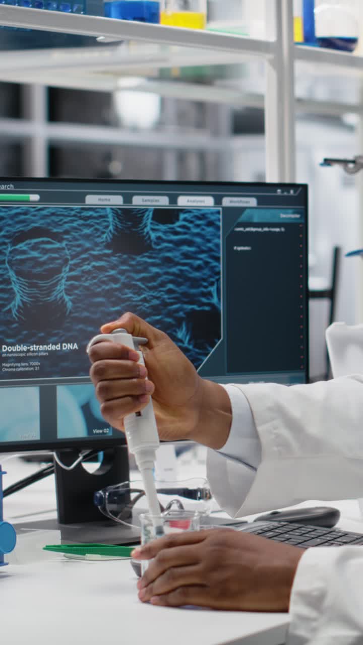 Vertical video Histology technician uses pipette to extract reagent from glass into test tube