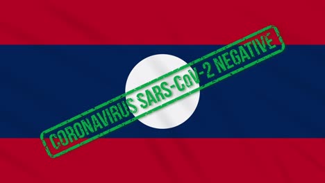 laos swaying flag with green stamp of freedom from coronavirus, loop