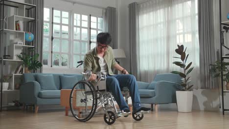 asian man sitting in a wheelchair and exercising with dumbbell at home