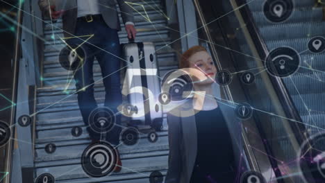 5g text over network of connections against businesswoman and businessman using escalator