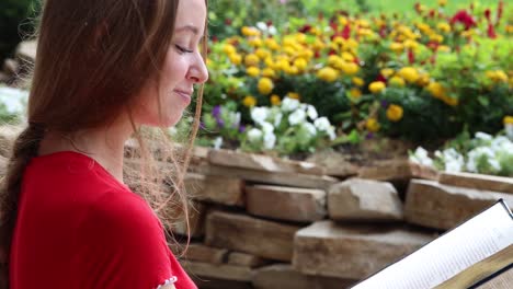 reading in a campus garden a young student enjoying a quiet moment