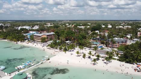 dominican republic - boca chica 2022 - wide shot aerial over resort hotels for tourists in the caribbean