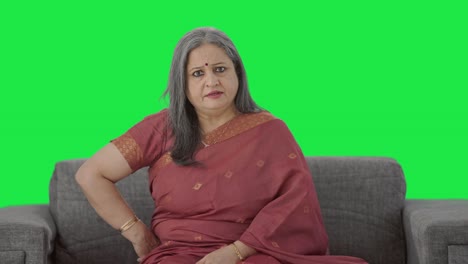 Angry-Indian-old-woman-looking-Green-screen