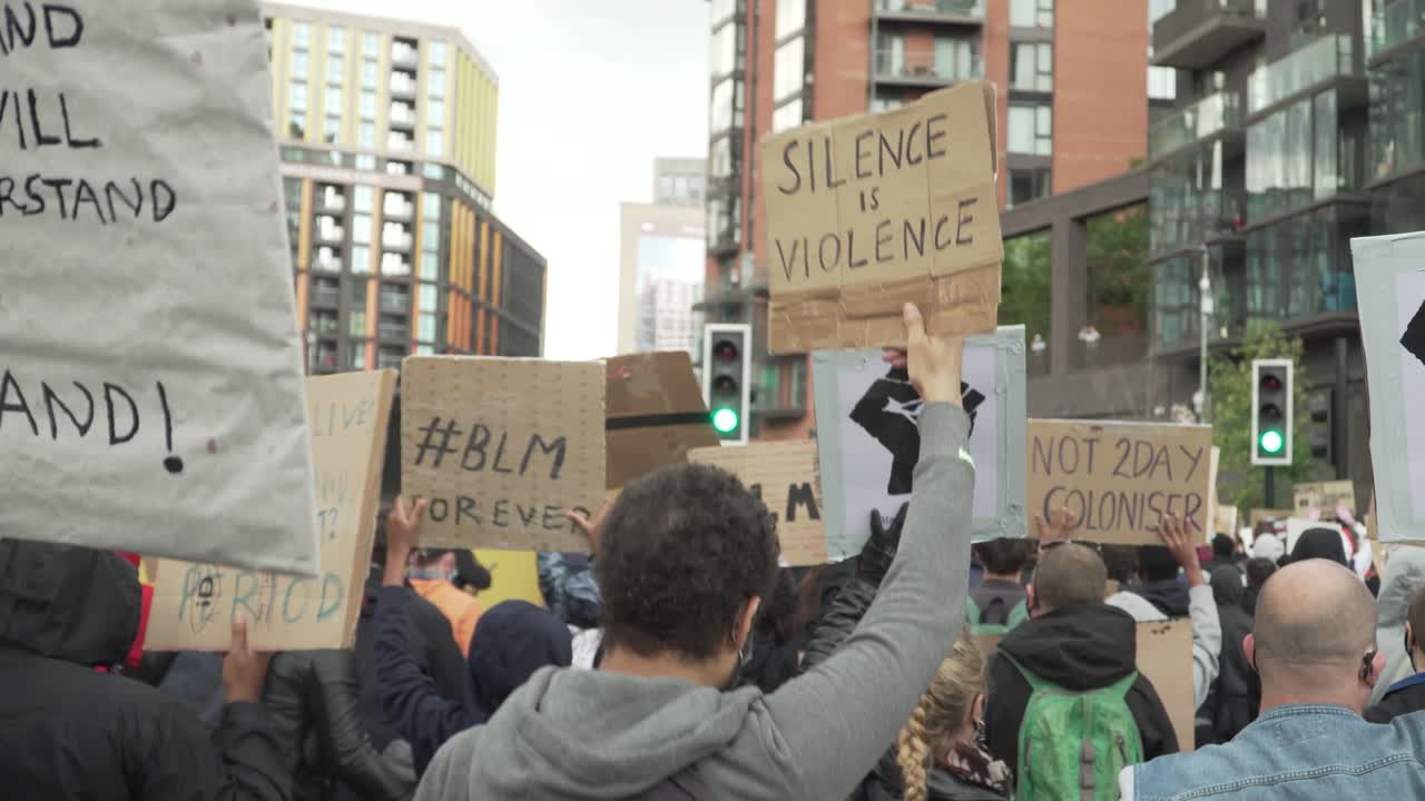 Free stock video - London blm protestors marching and holding signs