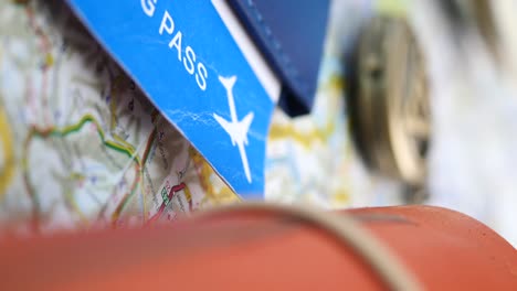passport and boarding pass with travel map