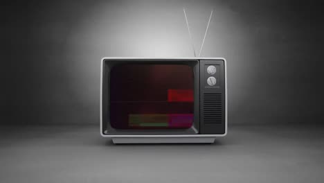 Old-TV-switch-on-with-animation-on-screen-and-a-grey-background