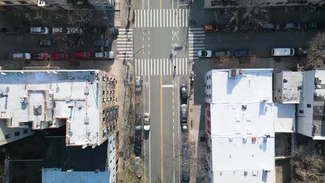 top down aerial view of new york city street on spring day in manhattan