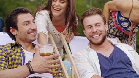 group of young people are happy at the music festival