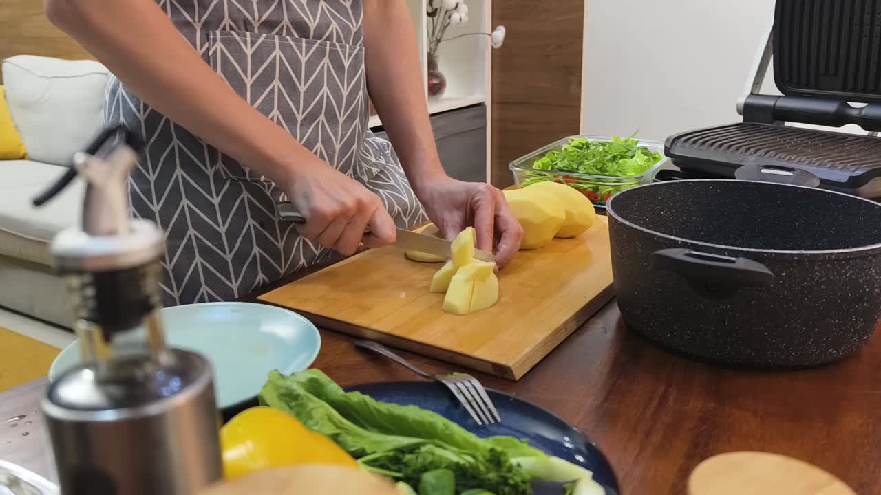 Person preparing food in the kitchen