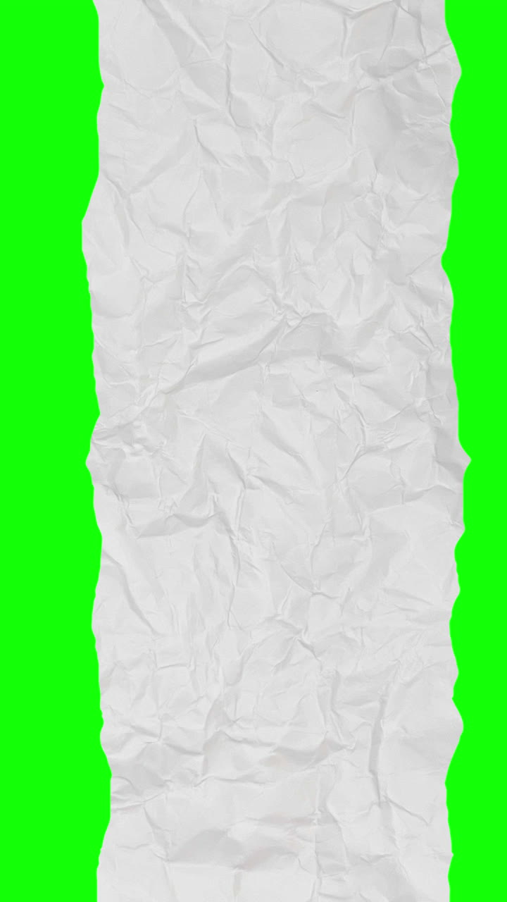 Crumpled Paper Tearing and Revealing Green Screen Transition