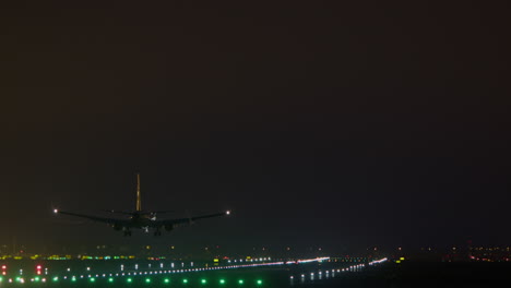 airplane landing at night