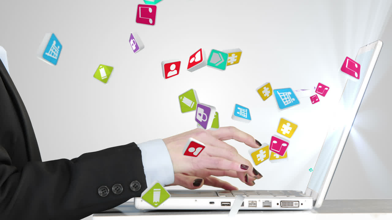 iconos coloridos que salen de la computadora portátil