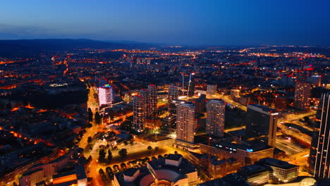 new residential modern area with bright illumination. contemporary scenery of bratislava, slovakia at night. aerial view