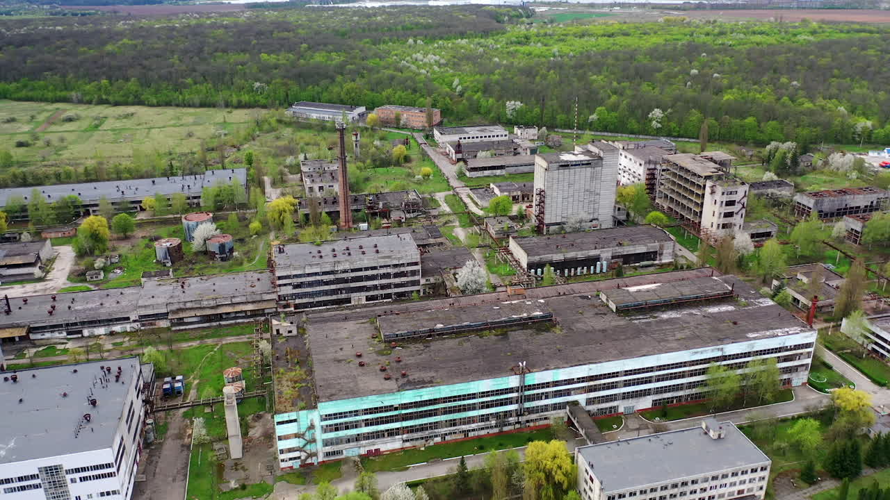 Empty apocalipse city with damaged houses. Aerial view of ruined abandoned building.
