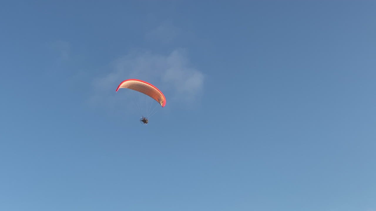 Powered Paragliding Flying Across the Sky