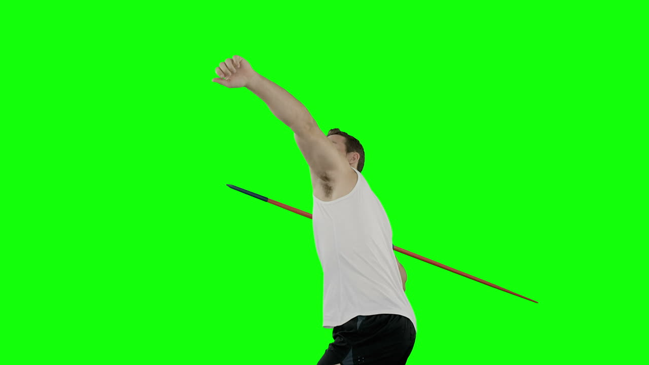 Athlete man practising javelin throwing