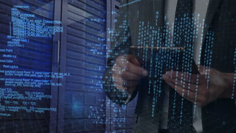 man uses tablet in server room, highlighting digital data processing and online security.