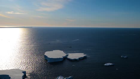 tabular icebergs in antarctica seen from helicopter