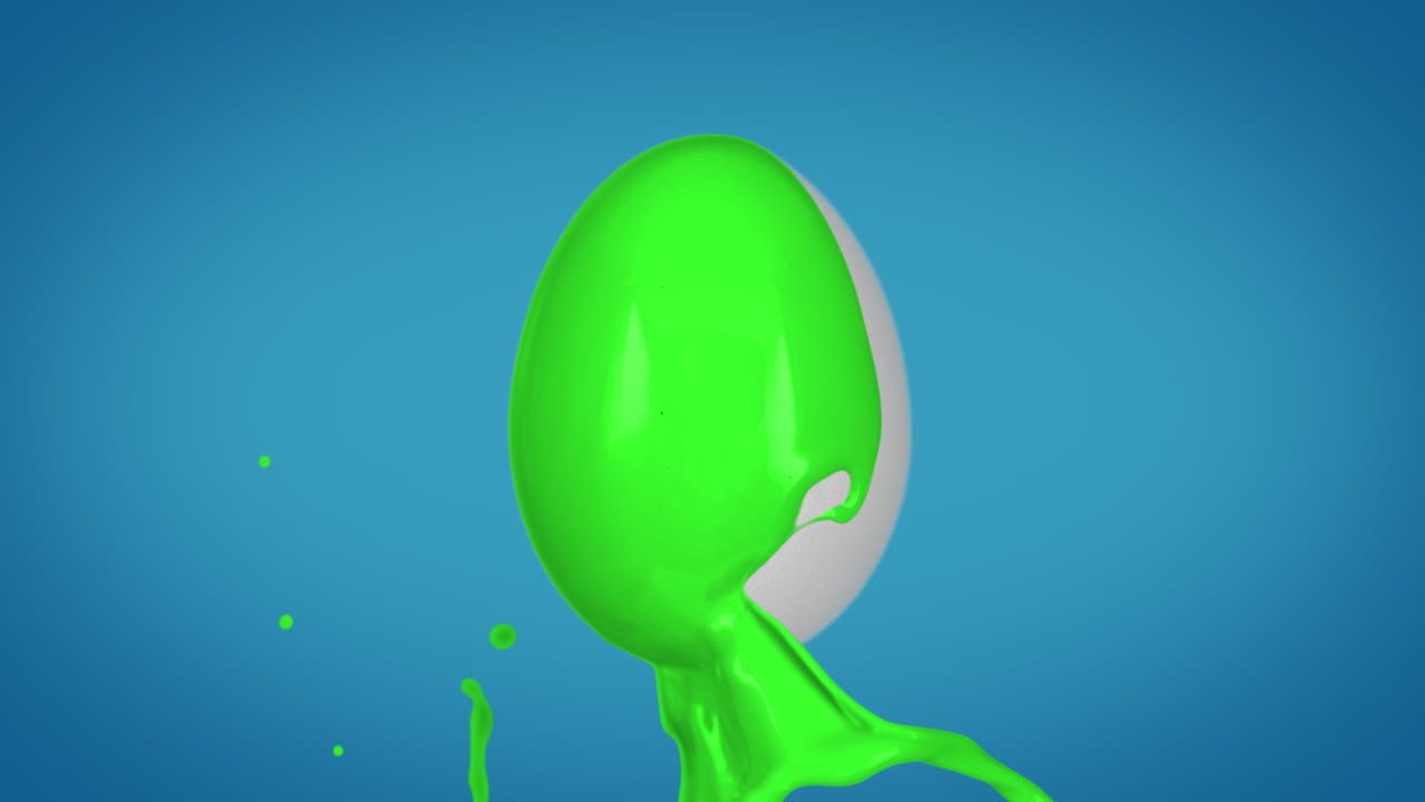 huevo de pascua pintado de verde lima por salpicaduras de tinte en cámara lenta y macro