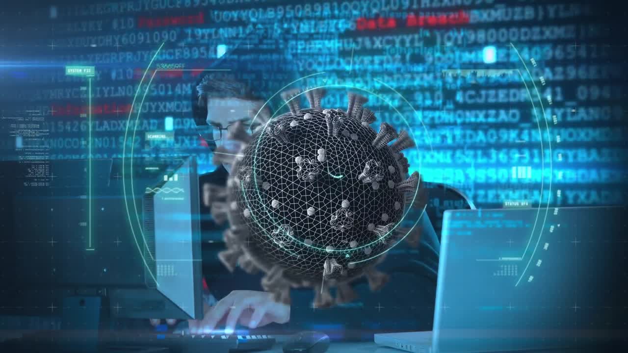 animación de las células macro covid19 sobre un hombre que lleva una balaclava, usando una computadora portátil