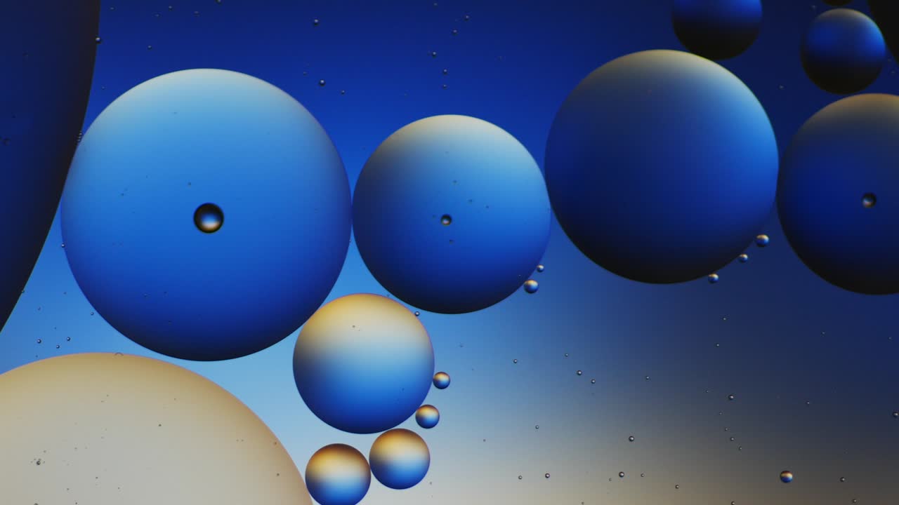 Colorful artistic of oil drop floating on the water.