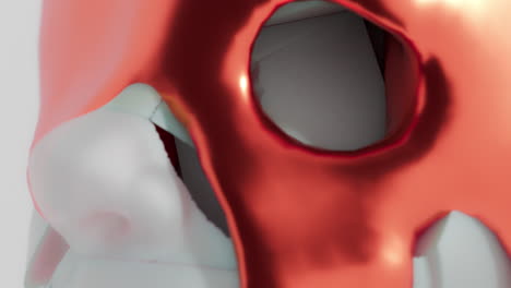 a red liquid metal flows slowly on the sculpture