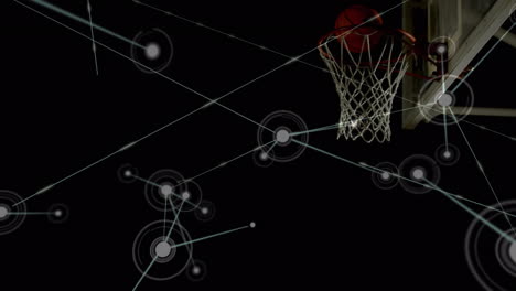 animation of networks of connections over biracial male basketball player at gym