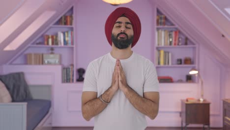 religious sikh indian man praying to god