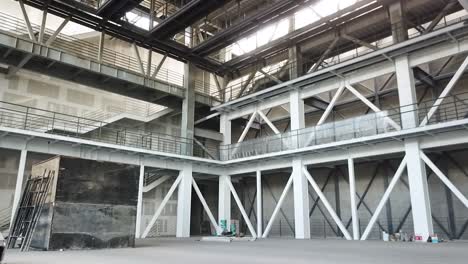 Drone-shot-crossing-the-metal-structure-of-a-building-under-construction-in-an-ascending-manner-in-Mexico-City