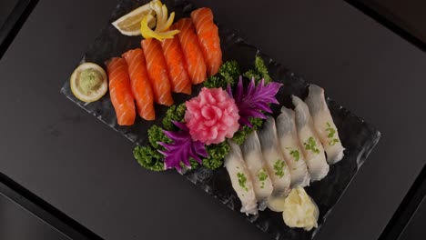 a refined platter of white fish and salmon sushi with delicate texture and deep umami. 흰살 생선과 연어 초밥이 조화를 이루는 고급스러운 한 접시.