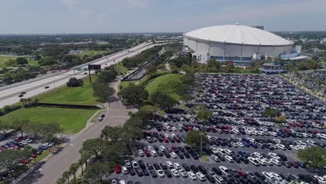 4k aerial drone video of tropicana field and full parking lots next to interstate 175 in downtown st