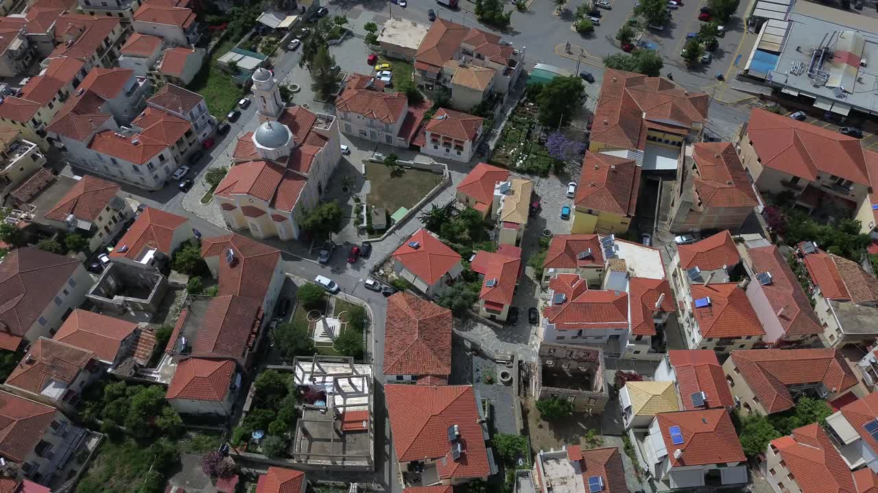 Aerial , high angle, bird's eye view of historical center at Kalamata, Messinia, Peloponnesus, Greece, rotating 4k shot