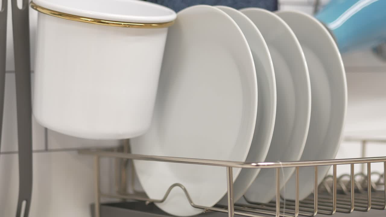 Clean Dishes Drying on a Rack