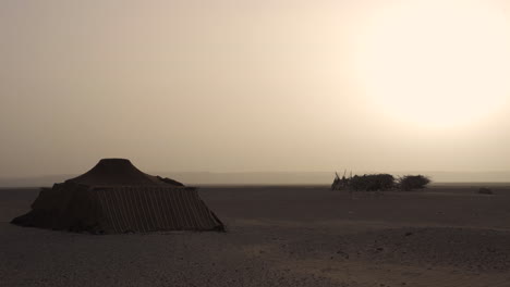 Nomad-camp-setting-at-sunset-in-the-Merzouga-desert-Morocco-Africa,-exploring-wilderness-destination