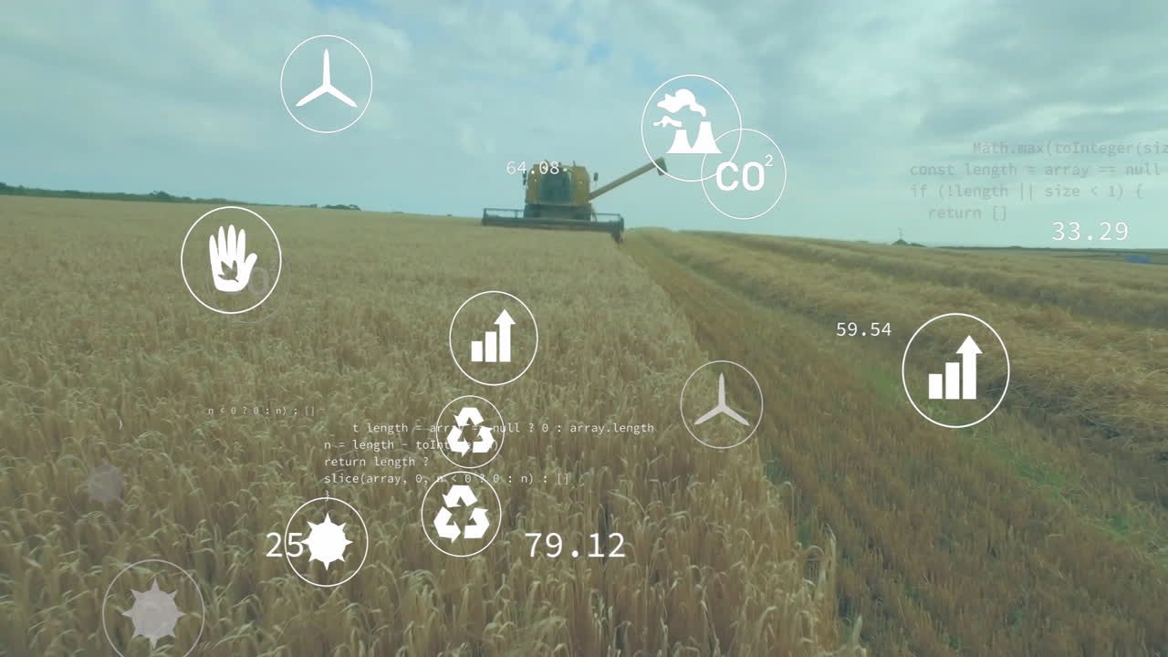Combine harvester moving through golden wheat field, displaying digital CO? icons and data overlays