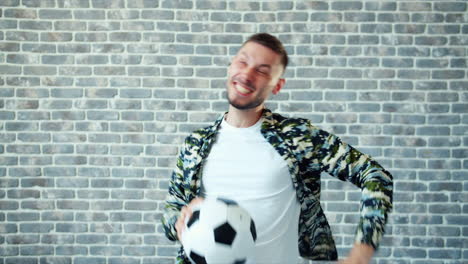 man celebrating a soccer goal
