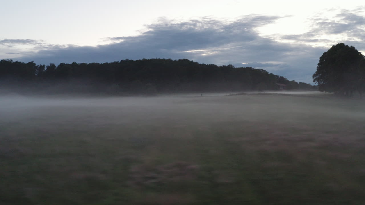 k Drone shot of morning fog over a