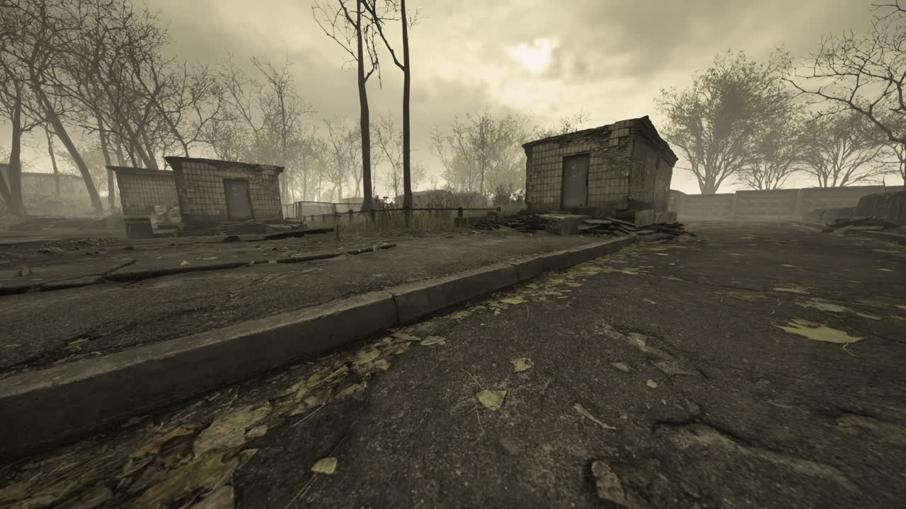 Eerie abandoned neighborhood with barren trees and cloudy skies