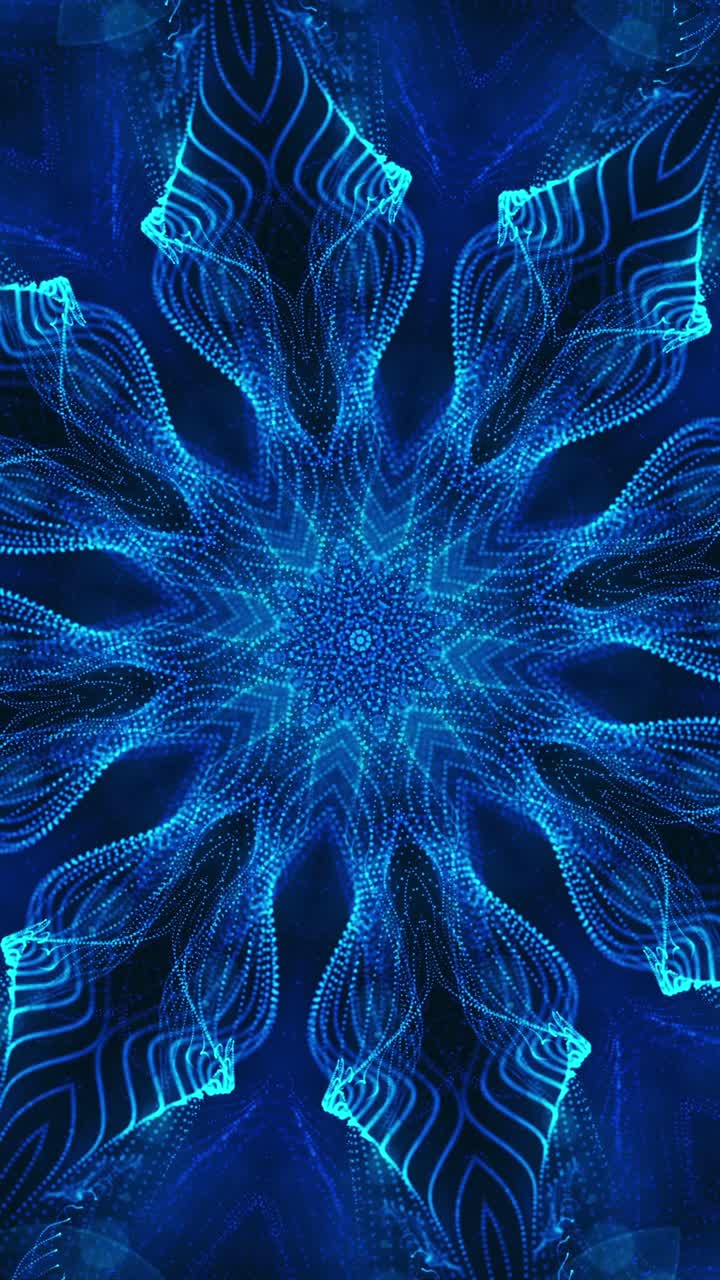 Blue flower with black background and blue center. Kaleidoscope VJ loop Vertical