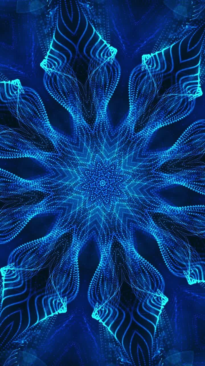 Blue flower with black background and blue center. Kaleidoscope VJ loop Vertical
