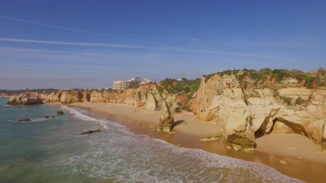 Surfing-at-the-beach-of-Portimao,-Portugal