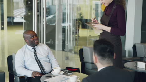 business meeting in a modern cafe
