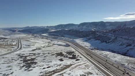 a pan over a colorado highway captures a picturesque winter scene